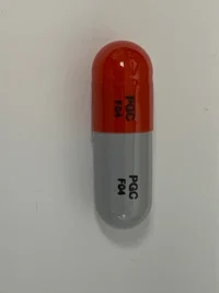 Pill with imprint PGC F04, gray & red, capsule, 20 mm (Cycloserine 250 mg)