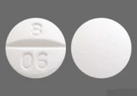 Pill with imprint 8 06, white, round, 10 mm (Trazodone Hydrochloride 100 mg)