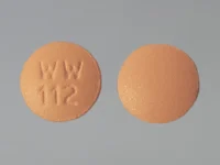 Pill with imprint WW 112, orange, round, 17 mm (Doxycycline Hyclate 100 mg)