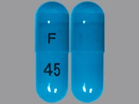 Pill with imprint F 45, blue, capsule, 18 mm (Atomoxetine 40 mg)
