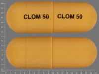 Pill with imprint CLOM50, yellow, capsule, 20 mm (Clomipramine Hydrochloride 50 mg)