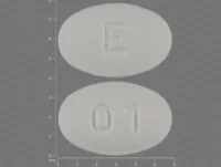 Pill with imprint E 01, white, oval, 6 mm (Carvedilol 3.125 mg)
