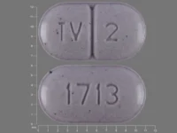 Pill with imprint TV 2 1713, purple, oval, 11 mm (Warfarin Sodium 2 mg)