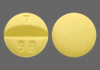 Pill with imprint 7 98, yellow, round, 8 mm (Labetalol Hydrochloride 100 mg)
