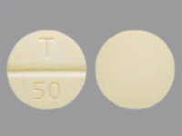 Pill with imprint T 50, yellow, round, 11 mm (Phenytoin 50 mg)