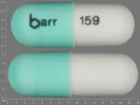 Pill with imprint barr 159, green & white, capsule, 14 mm (Chlordiazepoxide Hydrochloride 25 mg)