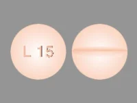 Pill with imprint L15, orange, round, 6 mm (Levothyroxine Sodium 0.025 mg)