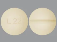 Pill with imprint L22, brown, round, 6 mm (Levothyroxine Sodium 0.125 mg)