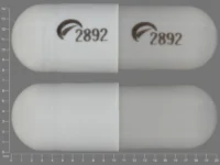 Pill with imprint 2892 2892, gray & white, capsule, 20 mm (Duloxetine 60 mg)