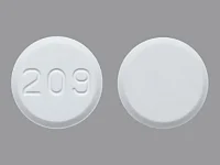 Pill with imprint 209, white, round, 11 mm (Amlodipine Besylate 10 mg)