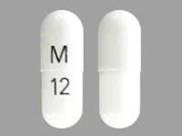 Pill with imprint M 12, white, capsule, 16 mm (Celecoxib 100 mg)