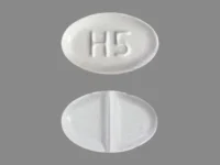 Pill with imprint H 5, white, oval, 8 mm (Hydrocortisone 5 mg)