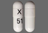 Pill with imprint X 51, white, capsule, 17 mm (Phenytoin Sodium 100 mg)