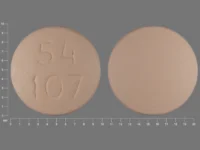 Pill with imprint 54 107, brown, round, 10 mm (Lithium Carbonate 300 mg)