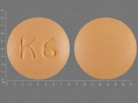Pill with imprint K 6, orange, round, 8 mm (Cyclobenzaprine Hydrochloride 5 mg)