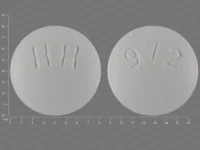 Pill with imprint 972 HH, white, round, 8 mm (Ropinirole Hydrochloride 0.25 mg)
