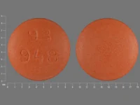 Pill with imprint 93 948, orange, round, 8 mm (Diclofenac Potassium 50 mg)