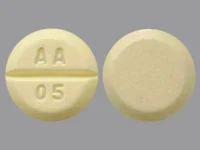 Pill with imprint AA 05, yellow, round, 6 mm (Phytonadione 5 mg)