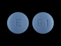 Pill with imprint E 61, blue, round, 8 mm (Finasteride 5 mg)