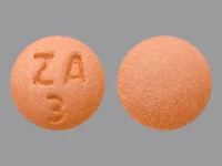 Pill with imprint ZA 3, brown, round, 8 mm (Amitriptyline Hydrochloride 50 mg)