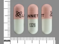 Pill with imprint LANNETT 1326, pink & white, capsule, 22 mm (Ursodiol 300 mg)