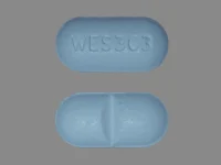 Pill with imprint WES 303, blue, capsule, 15 mm (Hydrocodone Bitartrate and Acetaminophen Hydrocodone Bitartrate 10 mg / Acetaminophen 325 mg)