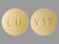 Pill with imprint LU Y17, yellow, round, 9 mm (Quetiapine 100 mg)