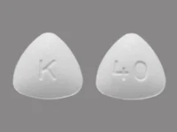 Pill with imprint K 40, white, triangle, 8 mm (Entecavir 0.5 mg)