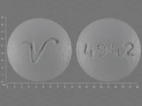 Pill with imprint 4942 V, gray, round, 9 mm (Perphenazine 8 mg)