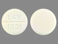 Pill with imprint LAN 1231, white, round, 10 mm (Primidone 250 mg)