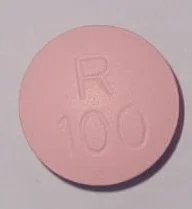 Pill with imprint R100, pink, round, 12 mm (Metoprolol Tartrate 100 mg)