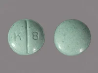 Pill with imprint K 8, green, round, 6 mm (Oxycodone Hydrochloride 15 mg)