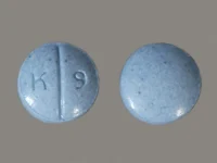 Pill with imprint K 9, blue, round, 6 mm (Oxycodone Hydrochloride 30 mg)