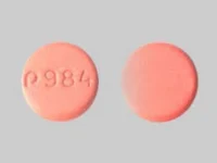 Pill with imprint P 984, pink, round, 1 mm (Nateglinide 60 mg)