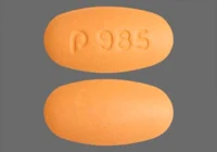 Pill with imprint P 985, orange, oval, 6 mm (Nateglinide 120 mg)
