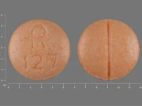 Pill with imprint R127, orange, round, 6 mm (Clonidine Hydrochloride 0.1 mg)