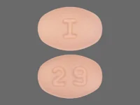 Pill with imprint I 29, pink, oval, 6 mm (Rosuvastatin Calcium 5 mg)