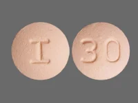Pill with imprint I 30, pink, round, 6 mm (Rosuvastatin Calcium 10 mg)