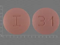 Pill with imprint I 31, pink, round, 7 mm (Rosuvastatin Calcium 20 mg)