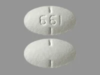 Pill with imprint 661, white, oval, 11 mm (Spironolactone 50 mg)