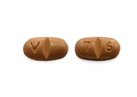 Pill with imprint V 7 6, brown, oval, 4 mm (Oxcarbazepine 150 mg)