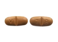 Pill with imprint V 7 8, brown, oval, 7 mm (Oxcarbazepine 600 mg)