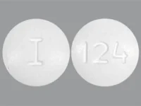 Pill with imprint I 124, white, round, 9 mm (Metronidazole 250 mg)