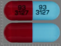 Pill with imprint 93 3127 93 3127, blue & red, capsule, 19 mm (Disopyramide Phosphate 100 mg)