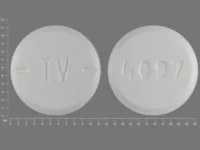 Pill with imprint 4097 TV, white, round, 11 mm (Baclofen 20 mg)