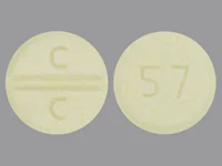 Pill with imprint C C 57, yellow, round, 10 mm (Clozapine 100 mg)