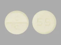 Pill with imprint C C 55, yellow, round, 8 mm (Clozapine 50 mg)