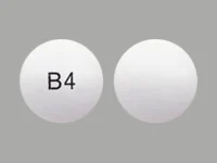 Pill with imprint B4, white, round, 10 mm (Chlorpromazine Hydrochloride 100 mg)