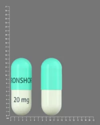 Pill with imprint IRONSHORE 20mg, green & yellow, capsule, 14 mm (Methylphenidate Hydrochloride 20 mg)