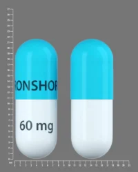 Pill with imprint IRONSHORE 60mg, turquoise & white, capsule, 22 mm (Methylphenidate Hydrochloride 60 mg)